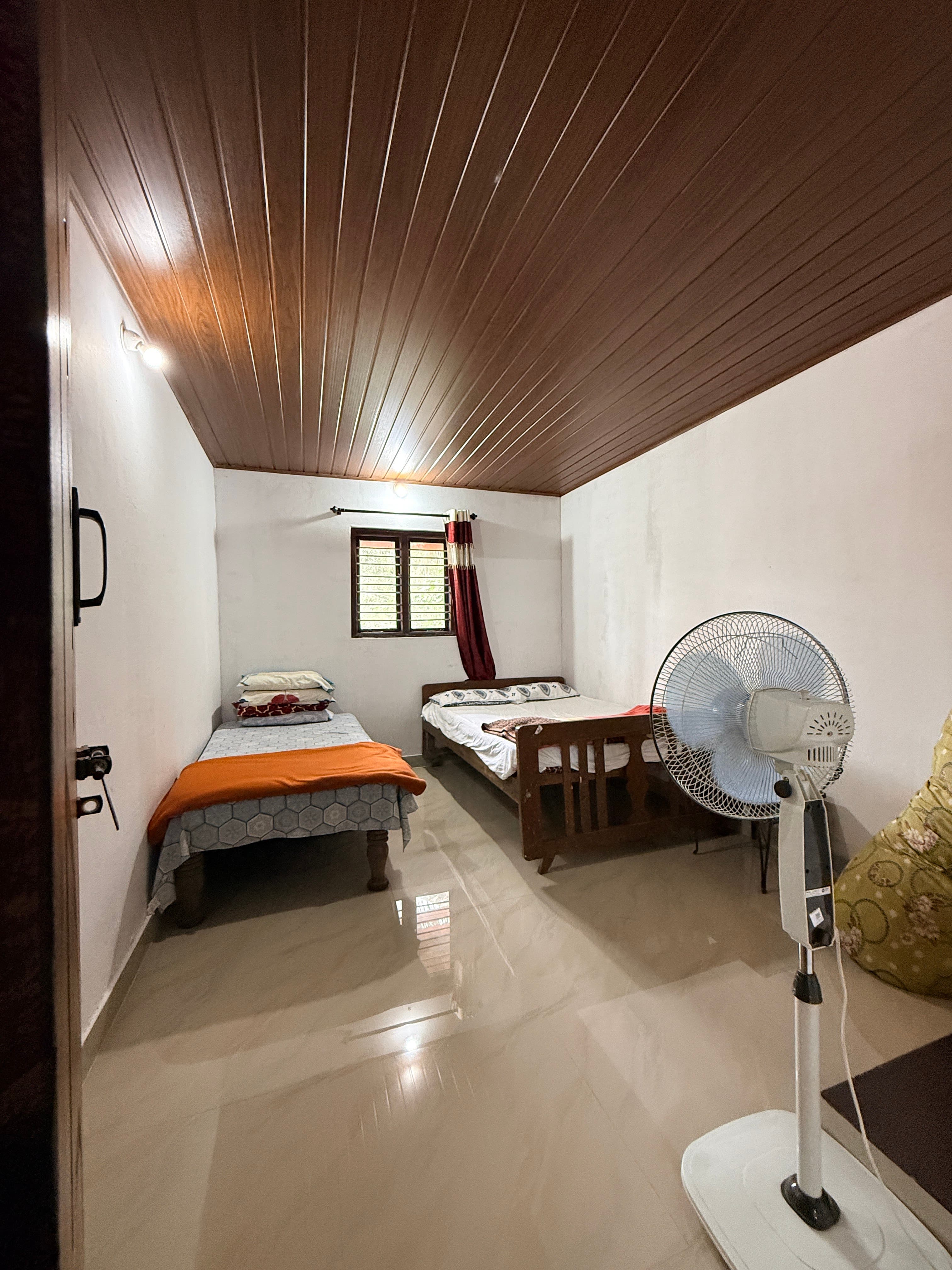 Cozy sitting area and wooden details inside the Family Suite
