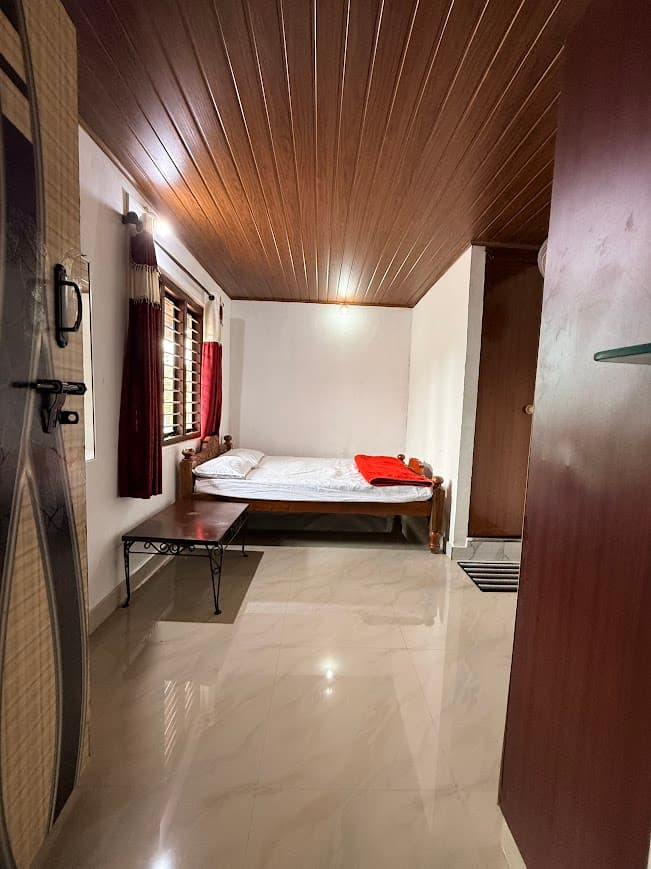 Cozy deluxe room interior showcasing comfortable bedding